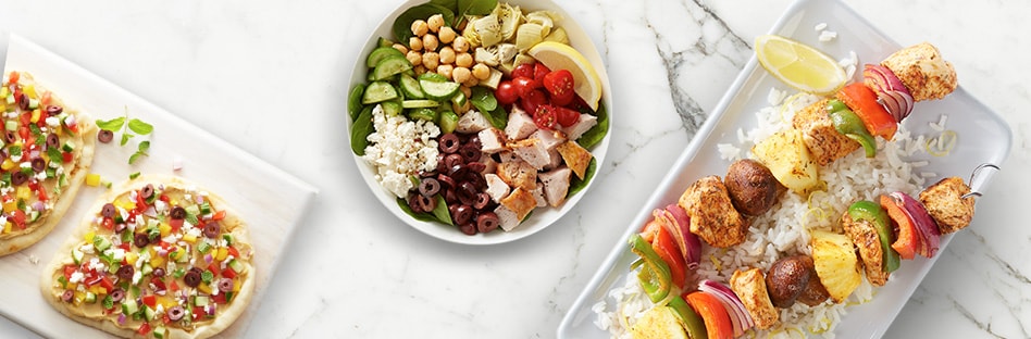 Flatbread, kebabs, and salad