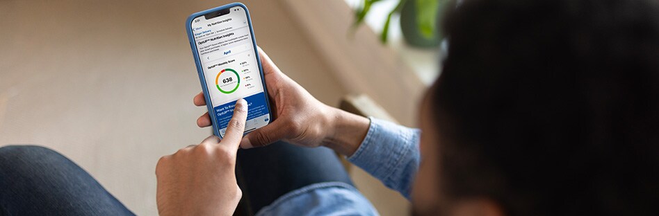  A person reviewing their OptUP score on their phone.