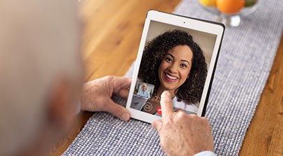 A customer working with a dietitian on a virtual call.